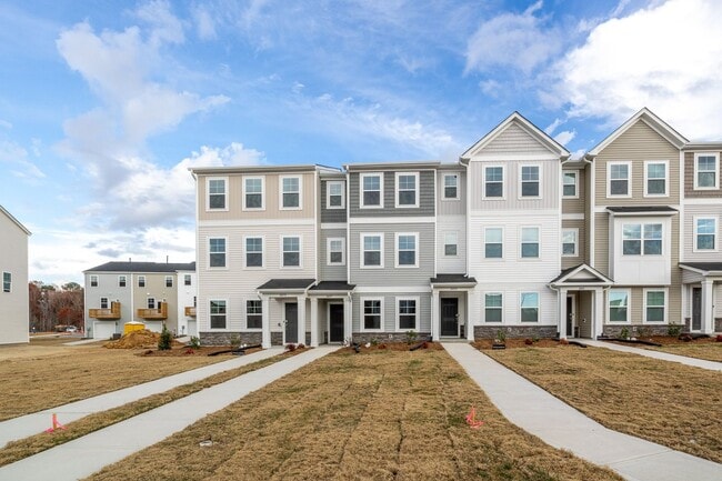 Building Photo - Stunning 3/3.5 Townhome in SE Raleigh