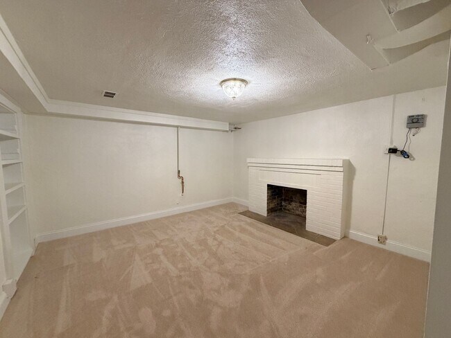 Building Photo - Classic Wash Park Gem with Detached Garage, Finished Basement & Stunning Great Room Addition