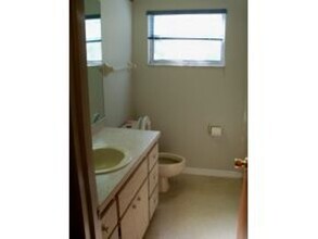 Building Photo - 3 BEDROOM 2 BATH RAINBOW ACRES-BIGGER THAN...