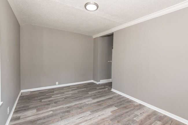 Building Photo - 8819 North Ave