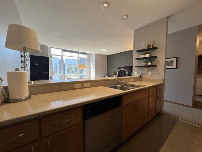 Building Photo - Top-Floor Pearl District Condo with Floor-to-Ceiling Windows, Courtyard Views & In-Unit Washer/Dryer