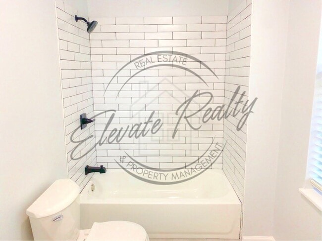 Building Photo - Stylishly Renovated Four Bedroom Home in H...