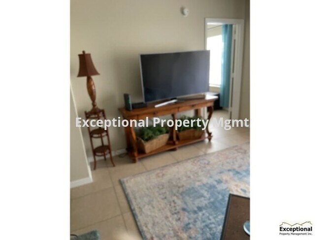 Building Photo - Beautiful Partially furnished annual renta...