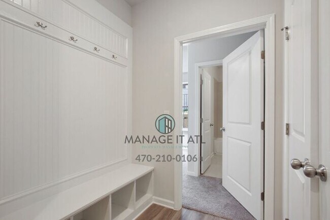 Building Photo - Modern 3-level Townhome featuring 4 bedrooms and 3 1/2 baths