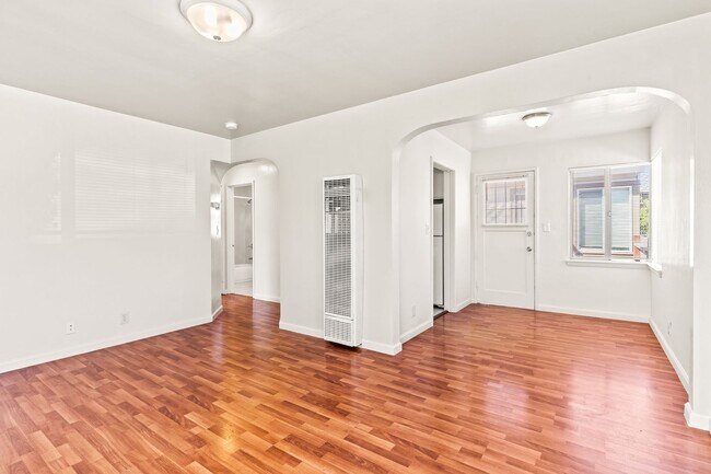 Building Photo - Renovated 1-Bedroom with Gated Parking & Garbage Paid!