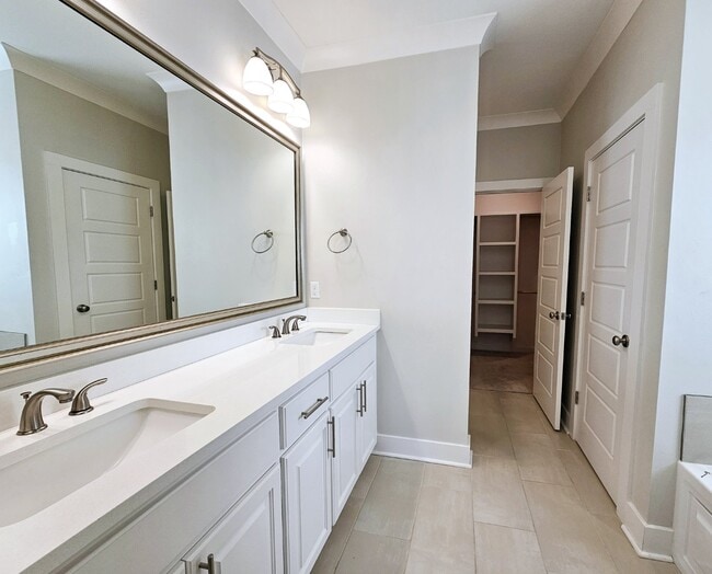 Building Photo - Stunning 4-Bedroom Waterfront Home with Granite Countertops and Hardwood Floors in The Sanctuary ...