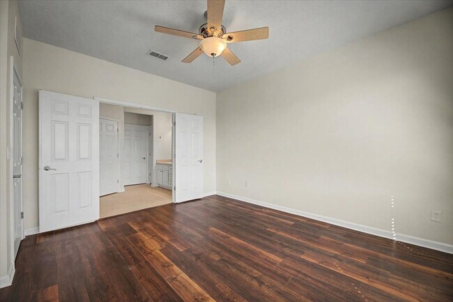 Building Photo - Peaceful Pond Views + Open Layout | 2BR + Office in Prime Location