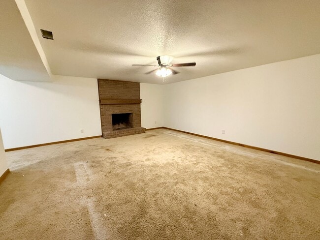 Building Photo - Beautifully Updated 5 Bedroom Rockrimmon Ranch Home Backing to Open Space