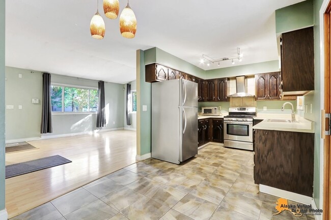 Building Photo - Eagle River Home w/ Fenced Yard, Sunroom, and Garage!