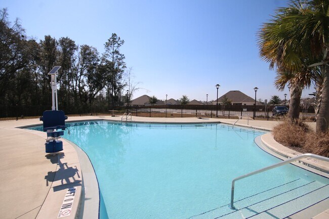 Building Photo - Stunning Modern 4-Bed, 2-Bath Home in Arbor Ridge – High Ceilings, Open Floor Plan, Granite Kitch...