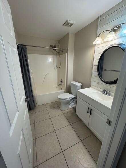 Downstairs bath - 12836 Woodmill Dr