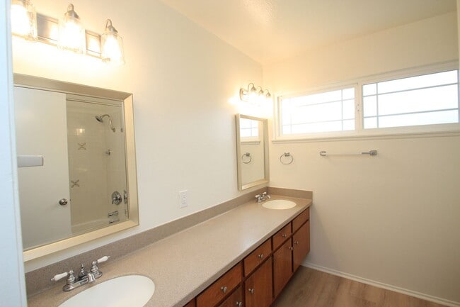 Building Photo - Welcome to this beautifully refreshed 4-bedroom, 2-bath two-story home located in desirable North...