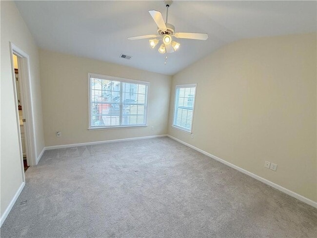 Building Photo - 4680 Creekside Villas Way