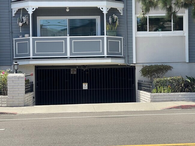 2 entrances to the subterranean garage. - 2411 Prospect Ave
