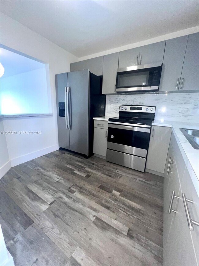 Building Photo - 6715 W 26th Dr