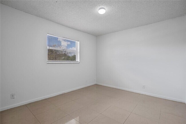 Building Photo - 3100 Coral Springs Dr