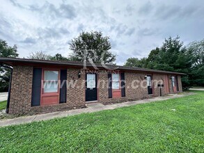 Building Photo - 1404 Main-E