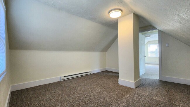 Building Photo - Updated 4BR house with garage!