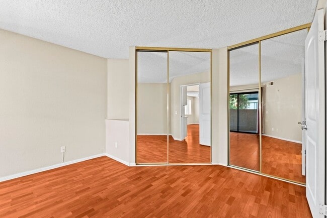 Building Photo - Stylish 1-Bed Condo with Balcony, Garage & Resort-Style Amenities in Mira Mesa