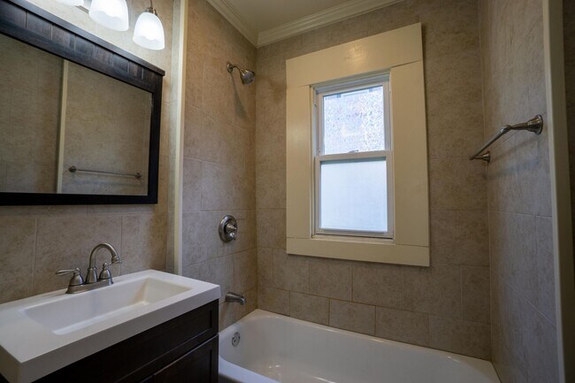 Building Photo - First Floor 3 Bedroom Apartment Close To C...