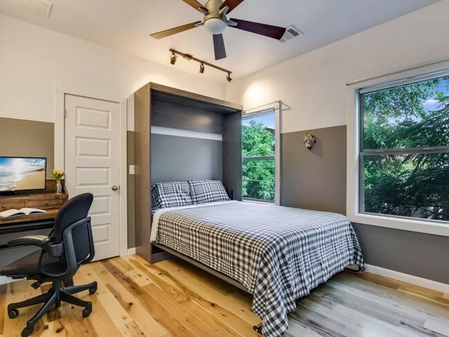 Upstairs bedroom with murphy bed - 2203 E 14th St