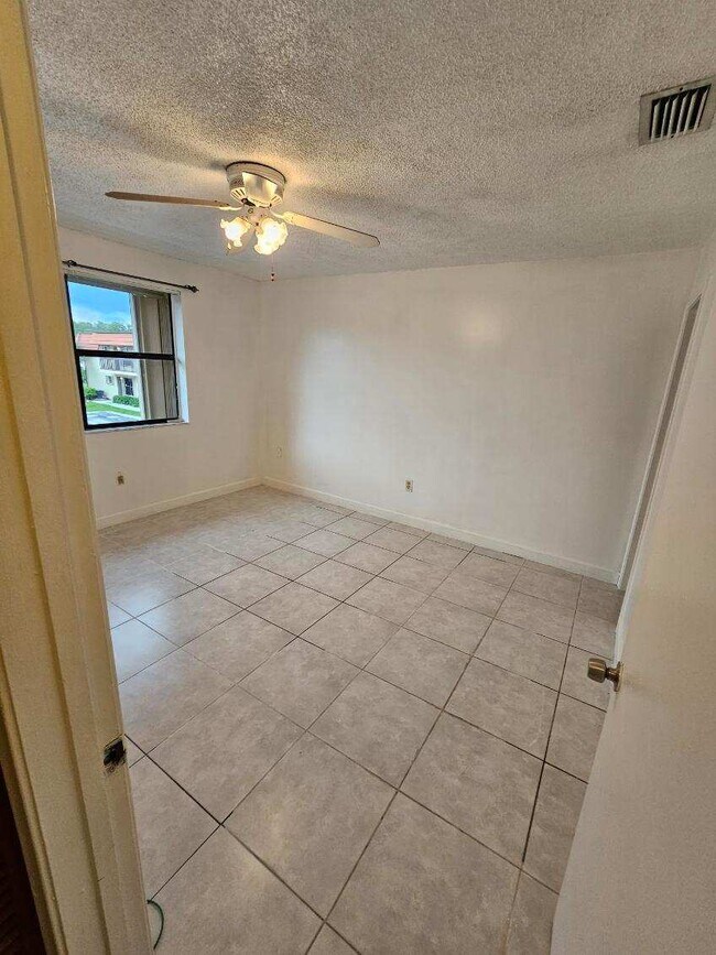 Building Photo - 10011 NW 4th St