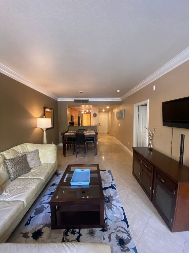 Building Photo - Fully furnished 2 bedroom unit in 24/7 guard gated community