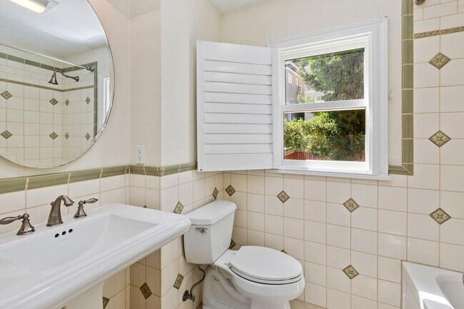 Building Photo - Forest Hill: Bright Updated Single Family Home with Garage, Backyard & Storage