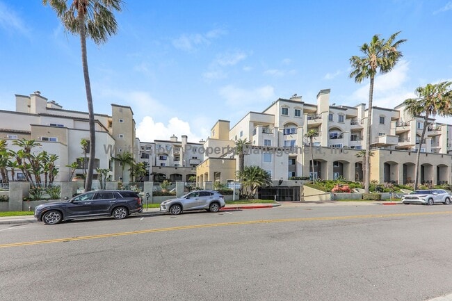 Building Photo - Ocean View Condo Just Steps from Main Street & the Beach – 3 Balconies, Gated Community, Pool & P...
