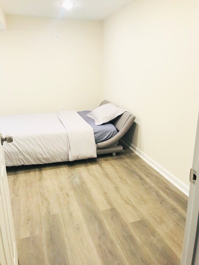 Bedroom #4 with large egress window, lots of natural light - 4806 Cherokee St