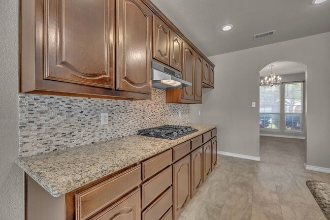 Building Photo - "Luxurious 4-Bedroom, 2.5 Bath Retreat wit...