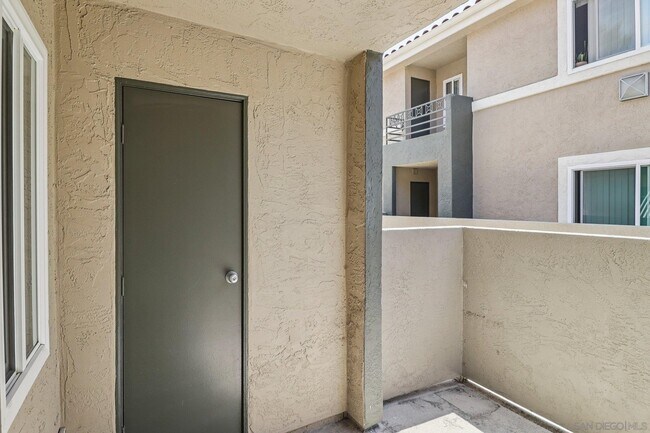 Building Photo - 7565 Charmant Dr