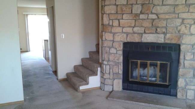 Building Photo - Available Now! "Charming 2-Bed Townhouse with Fireplace Oasis on South Trenton Street!"