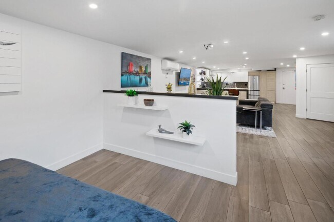 Building Photo - Live in one of San Diego’s most desirable locations in This award-winning architectural gem, "7 o...