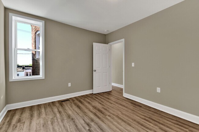 Building Photo - Fully Renovated 3 Bedroom Rowhome- Baltimo...