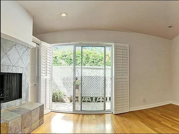 small private patio of fireplace room - 8938 Hubbard St
