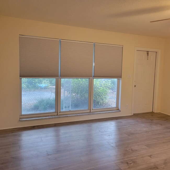 living room with new blackout blinds - 2031 NE 56th St