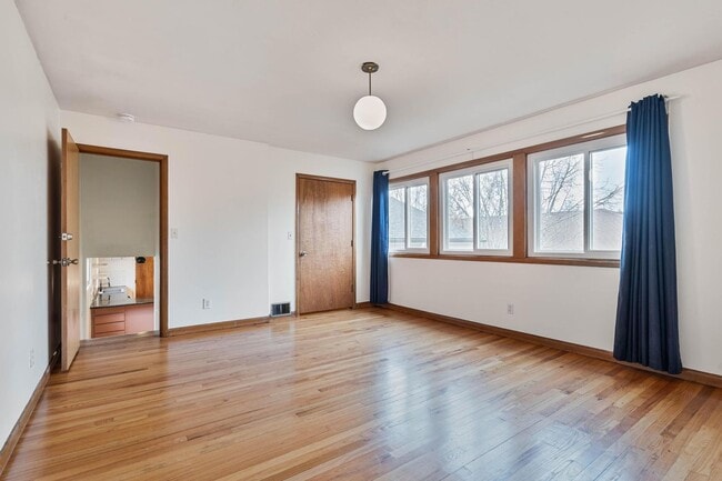 Building Photo - Beautiful, modern 4-bdrm/2-bath home in Concordia—Private, urban sanctuary w/ flex spaces
