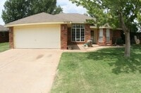 Building Photo - Brick 3 Bedroom Home! Stunning Backyard! M...