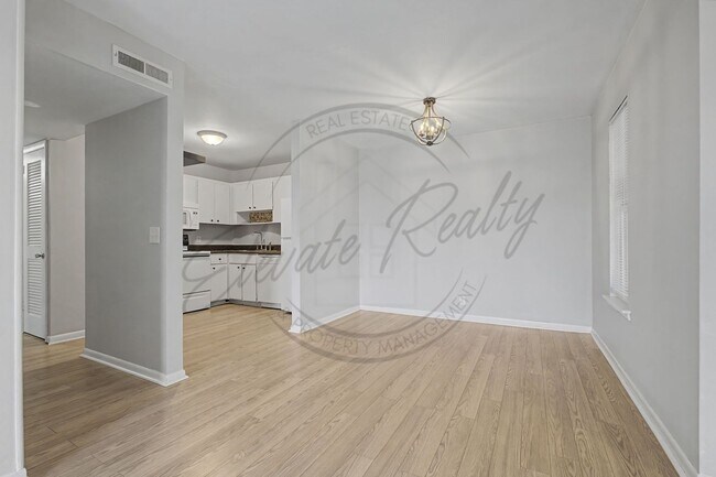 Building Photo - SPRING SPECIAL!! FIRST MONTH FREE on this Two Bedroom Condo, Second Floor, across from Madison Pa...