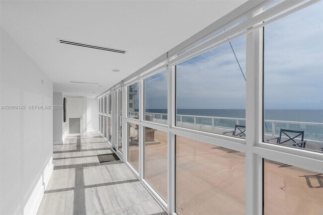Building Photo - 5005 Collins Ave