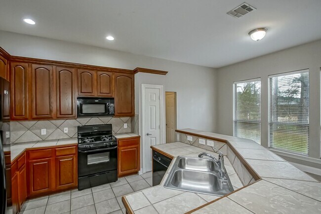 Building Photo - 12600 Woodland Hill Rd