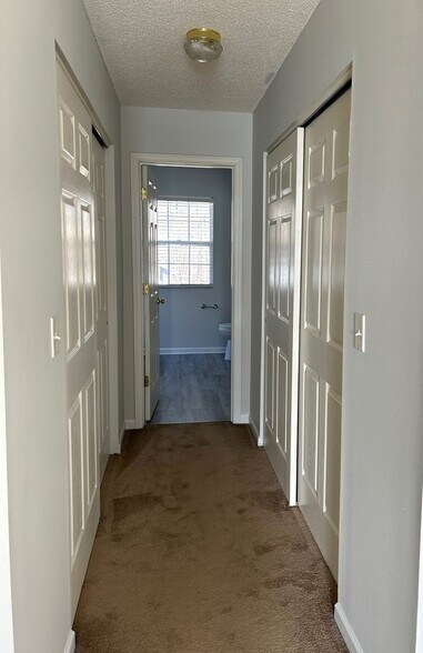 Primary bedroom hall of closets - 4505 Garden Club St