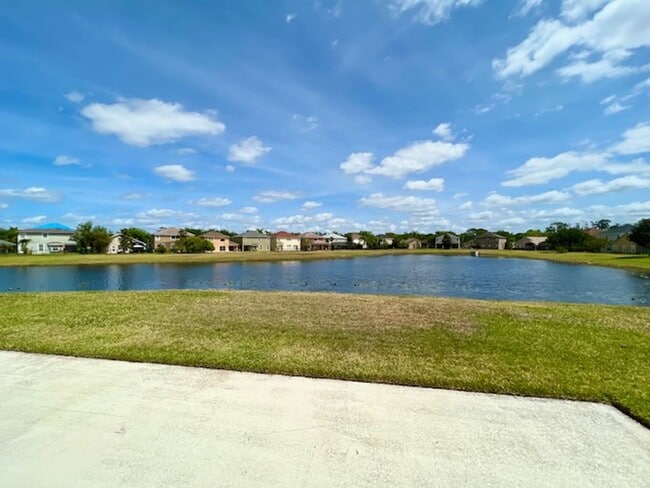 Building Photo - EAGLE CREEK LAKE NONA! WELCOME HOME! Beautiful water views! Spacious 2 story-3 bedroom 2.5 bath h...