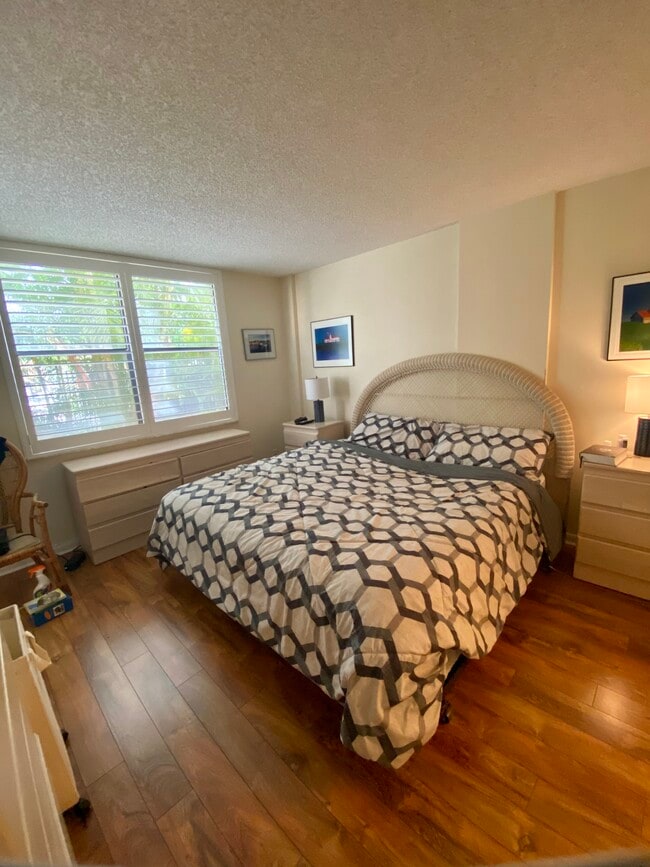 Primary bedroom leads to patio - 600 Egret Cir