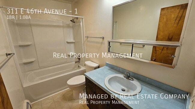 Building Photo - 311 E 46th Ave