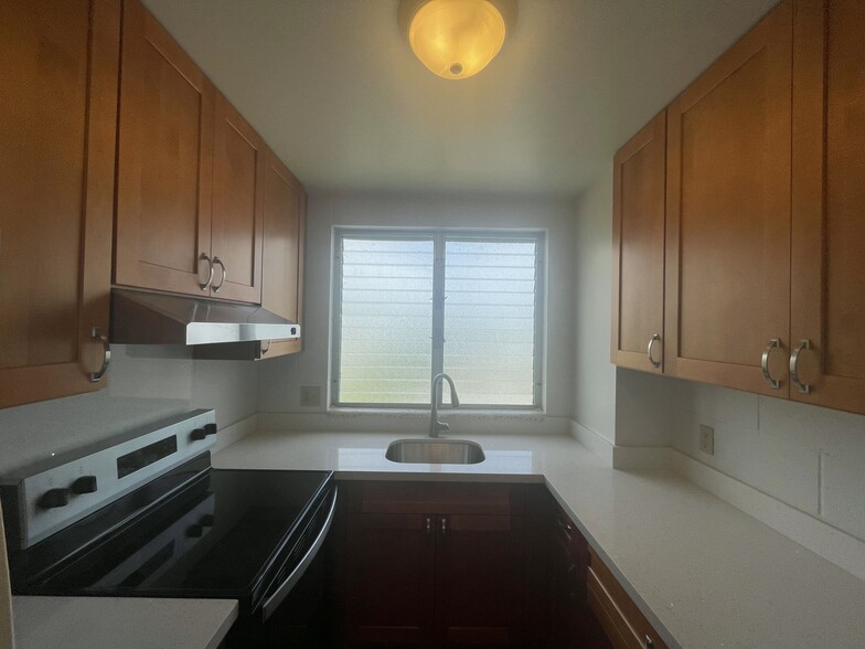 kitchen (brand new stove, countertops, and cabinets) - 1555 Pohaku St