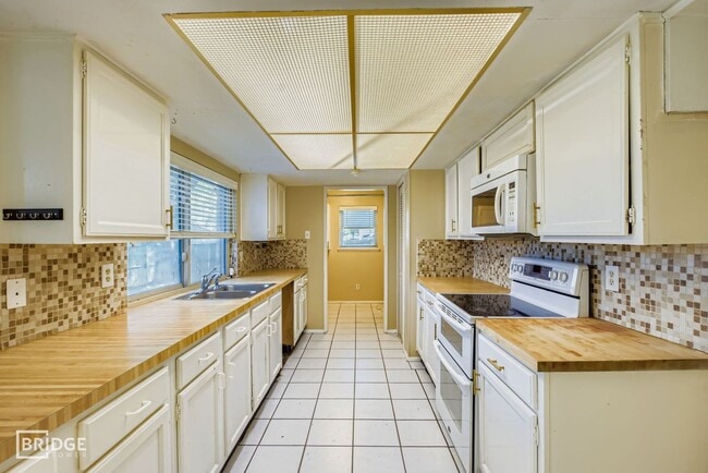 Building Photo - 11026 McCree Rd