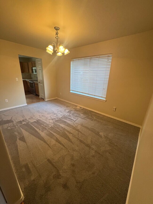 Building Photo - Three Bedroom, 2 Bath Home with New Carpet...