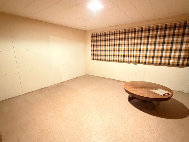 Building Photo - Country like setting! Spacious 3+ bed/ 1.5 bath house with garage, large yard, private deck and a...